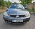 Серый Мицубиси Лансер, объемом двигателя 1.6 л и пробегом 190 тыс. км за 2999 $, фото 2 на Automoto.ua