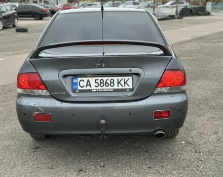 Серый Мицубиси Лансер, объемом двигателя 1.6 л и пробегом 250 тыс. км за 2550 $, фото 4 на Automoto.ua