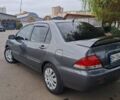 Сірий Міцубісі Lancer, об'ємом двигуна 1.6 л та пробігом 229 тис. км за 4900 $, фото 31 на Automoto.ua