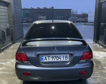 Серый Мицубиси Лансер, объемом двигателя 1.6 л и пробегом 213 тыс. км за 4450 $, фото 2 на Automoto.ua