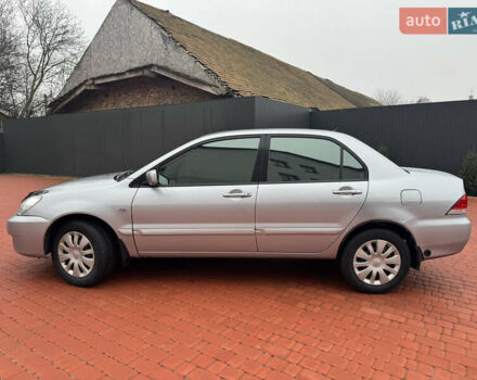 Серый Мицубиси Лансер, объемом двигателя 1.6 л и пробегом 242 тыс. км за 4300 $, фото 5 на Automoto.ua