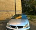 Сірий Міцубісі Lancer, об'ємом двигуна 1.6 л та пробігом 225 тис. км за 4300 $, фото 1 на Automoto.ua