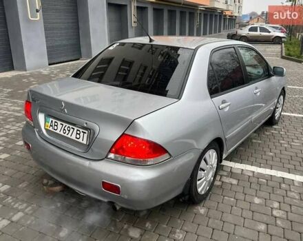 Серый Мицубиси Лансер, объемом двигателя 1.6 л и пробегом 333 тыс. км за 2800 $, фото 6 на Automoto.ua