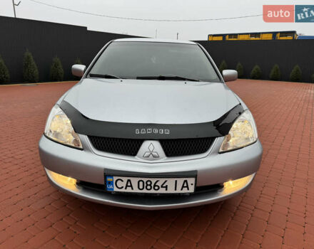 Серый Мицубиси Лансер, объемом двигателя 1.6 л и пробегом 242 тыс. км за 4300 $, фото 6 на Automoto.ua