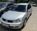 Міцубісі Lancer 2006 у Полтаві на Automoto.ua Сірий Міцубісі Lancer, об'ємом двигуна 1.6 л та пробігом 250 тис. км за 4500 $, фото 1 на Automoto.ua
