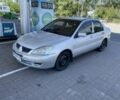 Сірий Міцубісі Lancer, об'ємом двигуна 1.6 л та пробігом 234 тис. км за 2204 $, фото 1 на Automoto.ua