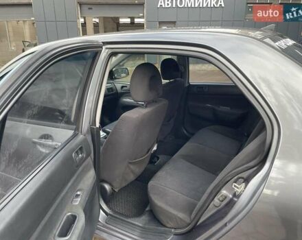 Сірий Міцубісі Lancer, об'ємом двигуна 1.6 л та пробігом 262 тис. км за 4400 $, фото 8 на Automoto.ua