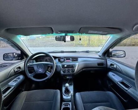 Мицубиси Лансер 2006 в Черновцах на Automoto.ua Серый Мицубиси Лансер, объемом двигателя 1.6 л и пробегом 299 тыс. км за 4300 $, фото 9 на Automoto.ua