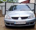 Сірий Міцубісі Lancer, об'ємом двигуна 1.6 л та пробігом 165 тис. км за 4900 $, фото 10 на Automoto.ua