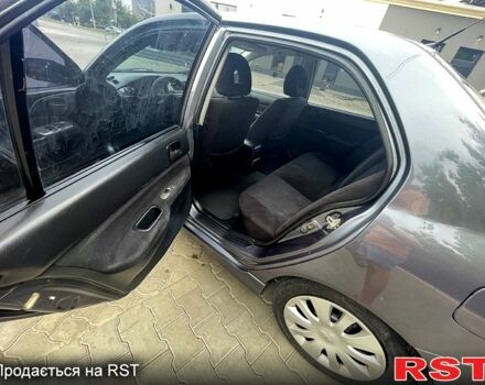 Сірий Міцубісі Lancer, об'ємом двигуна 1.6 л та пробігом 162 тис. км за 4650 $, фото 5 на Automoto.ua