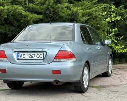 Серый Мицубиси Лансер, объемом двигателя 1.6 л и пробегом 220 тыс. км за 4400 $, фото 9 на Automoto.ua