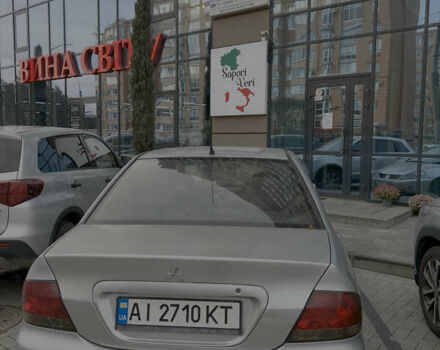 Серый Мицубиси Лансер, объемом двигателя 1.6 л и пробегом 310 тыс. км за 3500 $, фото 2 на Automoto.ua