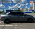 Сірий Міцубісі Lancer, об'ємом двигуна 1.6 л та пробігом 223 тис. км за 4500 $, фото 1 на Automoto.ua
