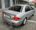 Сірий Міцубісі Lancer, об'ємом двигуна 1.58 л та пробігом 333 тис. км за 2950 $, фото 5 на Automoto.ua