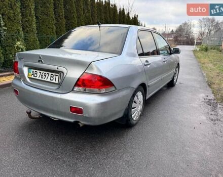 Сірий Міцубісі Lancer, об'ємом двигуна 1.58 л та пробігом 333 тис. км за 2750 $, фото 8 на Automoto.ua