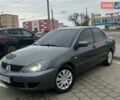 Сірий Міцубісі Lancer, об'ємом двигуна 1.58 л та пробігом 340 тис. км за 4200 $, фото 1 на Automoto.ua
