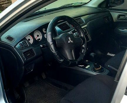 Сірий Міцубісі Lancer, об'ємом двигуна 1.6 л та пробігом 237 тис. км за 5000 $, фото 2 на Automoto.ua