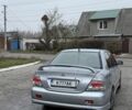 Серый Мицубиси Лансер, объемом двигателя 2 л и пробегом 256 тыс. км за 7000 $, фото 6 на Automoto.ua