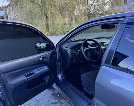 Мицубиси Лансер 2006 в Черновцах на Automoto.ua Серый Мицубиси Лансер, объемом двигателя 1.6 л и пробегом 299 тыс. км за 4300 $, фото 3 на Automoto.ua