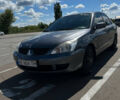 Сірий Міцубісі Lancer, об'ємом двигуна 1.6 л та пробігом 223 тис. км за 4500 $, фото 5 на Automoto.ua
