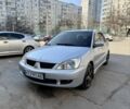 Серый Мицубиси Лансер, объемом двигателя 1.6 л и пробегом 224 тыс. км за 4200 $, фото 1 на Automoto.ua