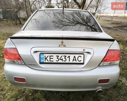 Серый Мицубиси Лансер, объемом двигателя 1.6 л и пробегом 234 тыс. км за 4300 $, фото 7 на Automoto.ua