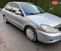 Сірий Міцубісі Lancer, об'ємом двигуна 1.58 л та пробігом 333 тис. км за 2750 $, фото 6 на Automoto.ua