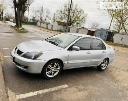 Сірий Міцубісі Lancer, об'ємом двигуна 2 л та пробігом 271 тис. км за 4500 $, фото 6 на Automoto.ua