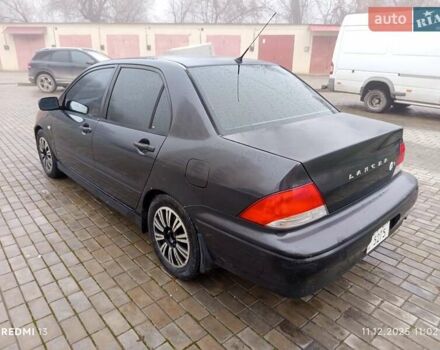 Сірий Міцубісі Lancer, об'ємом двигуна 2 л та пробігом 212 тис. км за 3333 $, фото 1 на Automoto.ua