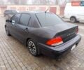Сірий Міцубісі Lancer, об'ємом двигуна 2 л та пробігом 212 тис. км за 3333 $, фото 1 на Automoto.ua