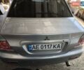 Сірий Міцубісі Lancer, об'ємом двигуна 1.58 л та пробігом 186 тис. км за 4300 $, фото 1 на Automoto.ua