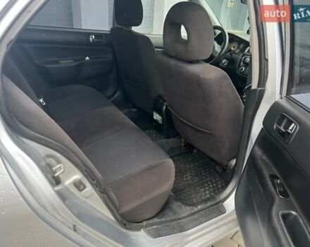 Серый Мицубиси Лансер, объемом двигателя 1.6 л и пробегом 333 тыс. км за 2800 $, фото 15 на Automoto.ua