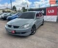Сірий Міцубісі Lancer, об'ємом двигуна 2 л та пробігом 263 тис. км за 4300 $, фото 1 на Automoto.ua