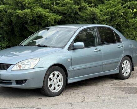 Серый Мицубиси Лансер, объемом двигателя 1.6 л и пробегом 220 тыс. км за 4400 $, фото 2 на Automoto.ua