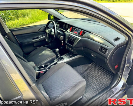 Серый Мицубиси Лансер, объемом двигателя 1.6 л и пробегом 188 тыс. км за 5490 $, фото 10 на Automoto.ua