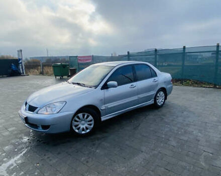 Серый Мицубиси Лансер, объемом двигателя 1.6 л и пробегом 253 тыс. км за 2850 $, фото 4 на Automoto.ua