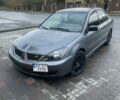 Сірий Міцубісі Lancer, об'ємом двигуна 1.6 л та пробігом 244 тис. км за 2999 $, фото 1 на Automoto.ua