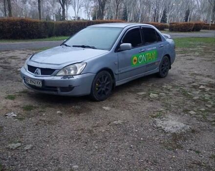 Сірий Міцубісі Lancer, об'ємом двигуна 1.58 л та пробігом 264 тис. км за 3200 $, фото 2 на Automoto.ua