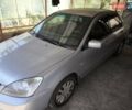 Сірий Міцубісі Lancer, об'ємом двигуна 1.58 л та пробігом 186 тис. км за 4300 $, фото 5 на Automoto.ua