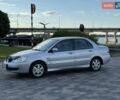 Серый Мицубиси Лансер, объемом двигателя 1.58 л и пробегом 278 тыс. км за 3999 $, фото 3 на Automoto.ua