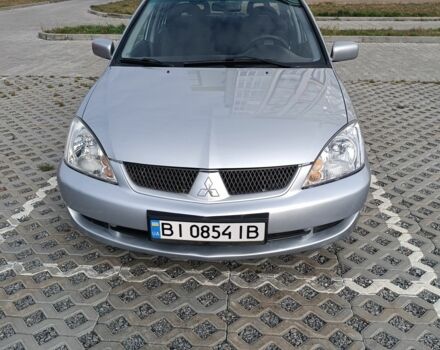 Сірий Міцубісі Lancer, об'ємом двигуна 1.6 л та пробігом 267 тис. км за 3600 $, фото 1 на Automoto.ua
