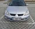 Сірий Міцубісі Lancer, об'ємом двигуна 1.6 л та пробігом 267 тис. км за 3600 $, фото 1 на Automoto.ua