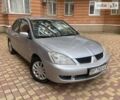 Сірий Міцубісі Lancer, об'ємом двигуна 1.6 л та пробігом 161 тис. км за 4999 $, фото 1 на Automoto.ua