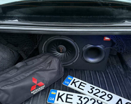 Серый Мицубиси Лансер, объемом двигателя 2 л и пробегом 256 тыс. км за 7000 $, фото 5 на Automoto.ua