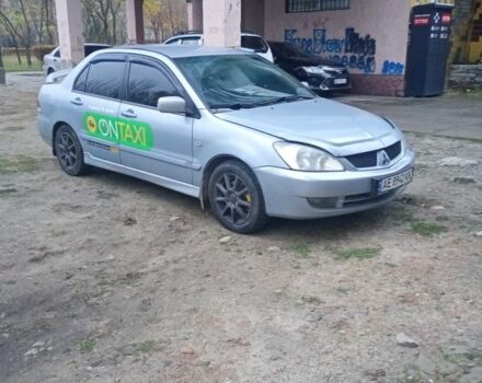 Сірий Міцубісі Lancer, об'ємом двигуна 1.6 л та пробігом 264 тис. км за 3200 $, фото 1 на Automoto.ua