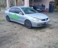 Сірий Міцубісі Lancer, об'ємом двигуна 1.6 л та пробігом 264 тис. км за 3200 $, фото 1 на Automoto.ua