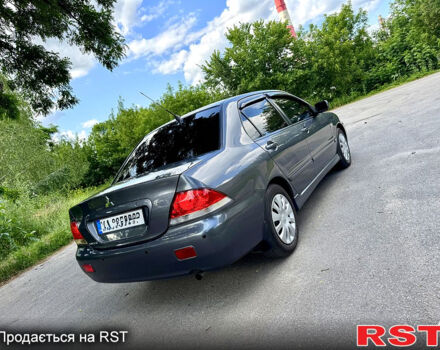 Серый Мицубиси Лансер, объемом двигателя 1.6 л и пробегом 188 тыс. км за 5490 $, фото 5 на Automoto.ua