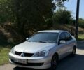 Сірий Міцубісі Lancer, об'ємом двигуна 1.6 л та пробігом 181 тис. км за 3451 $, фото 1 на Automoto.ua