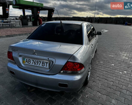 Сірий Міцубісі Lancer, об'ємом двигуна 1.58 л та пробігом 333 тис. км за 2700 $, фото 7 на Automoto.ua