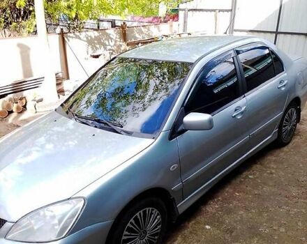 Сірий Міцубісі Lancer, об'ємом двигуна 1.6 л та пробігом 165 тис. км за 4900 $, фото 3 на Automoto.ua